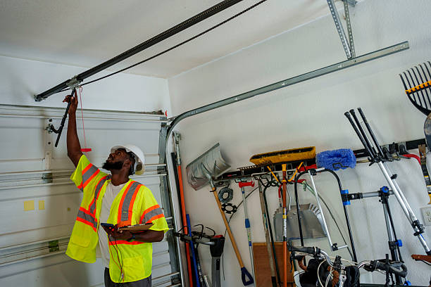 Professional Garage Door Panel Replacement technician working in Winona, MS